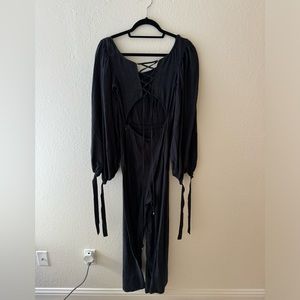 Free people faded black wide leg open back jumper size 4
